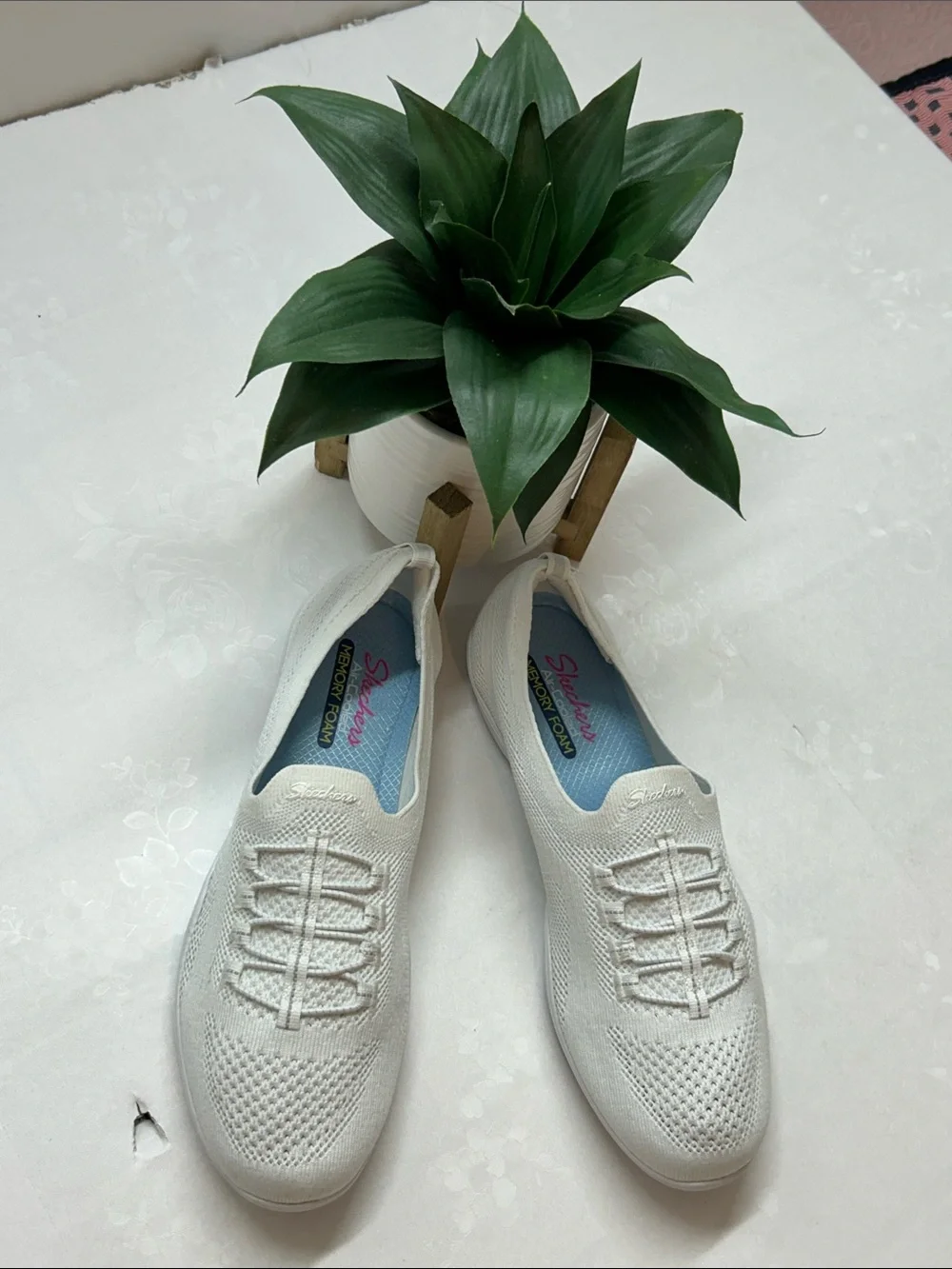 Skechers Women’s White Slip-On Knit Sneakers
